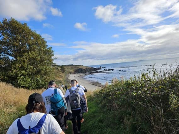 The team completed a 23-mile charity walk from Elie to St Andrews