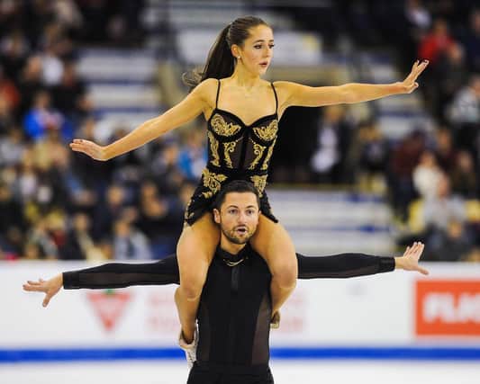 Lewis Gibson and Lilah Fear during their 2019 performance in Skate Canada, which won them a bronze medal. By: International Skating Union