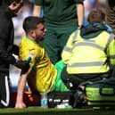 Grant Hanley is stretchered off after picking up an injury while playing for Norwich City against Blackburn Rovers at Ewood Park.