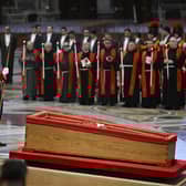 VATICAN CITY, VATICAN - APRIL 23: The body of Pope Francis lies in state at the Basilica St Peter on April 23, 2025 in Vatican City, Vatican. On the third day since the death of Pope Francis was announced by the Vatican, his body is transferred from the Chapel of Santa Marta to the Basilica St Peter. He will lie in state in a simple wooden coffin until his funeral, which will be held on Saturday, 26th April 2025. (Photo by Antonio Masiello/Getty Images)