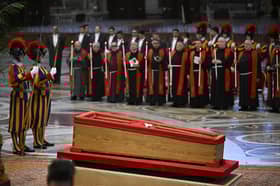 VATICAN CITY, VATICAN - APRIL 23: The body of Pope Francis lies in state at the Basilica St Peter on April 23, 2025 in Vatican City, Vatican. On the third day since the death of Pope Francis was announced by the Vatican, his body is transferred from the Chapel of Santa Marta to the Basilica St Peter. He will lie in state in a simple wooden coffin until his funeral, which will be held on Saturday, 26th April 2025. (Photo by Antonio Masiello/Getty Images)