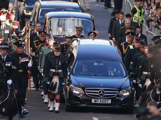 King Charles III and members of the royal family join the procession of Queen Elizabeth's coffin from the Palace of Holyroodhouse to St Giles' Cathedral, Edinburgh