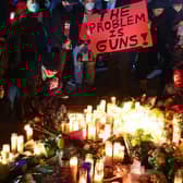 People attend a candlelight vigil for victims of a mass shooting in Monterey Park, California, in January. Eleven people died and nine more were injured (Picture: Mario Tama/Getty Images)