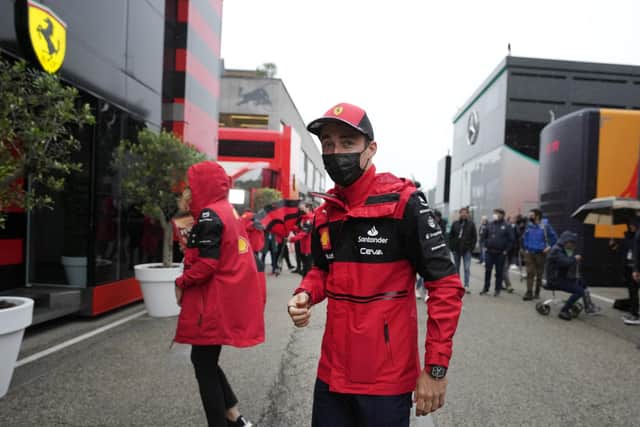 Ferrari driver Charles Leclerc of Monaco arrives in the paddock at the Dino and Enzo Ferrari racetrack, in Imola, Italy. Photo: AP Photo/Luca Bruno.