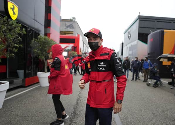 Ferrari driver Charles Leclerc of Monaco arrives in the paddock at the Dino and Enzo Ferrari racetrack, in Imola, Italy. Photo: AP Photo/Luca Bruno.
