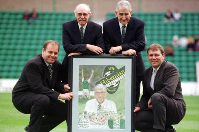 Left to right:   Graeme Cadger, Tom O'Malley, Douglas Cromb and Billy McLellan pictured in 1998 with a portrait of Kenny McLean senior, ex Hibs vice chairman and the leader of the Hands Off Hibs campaign.