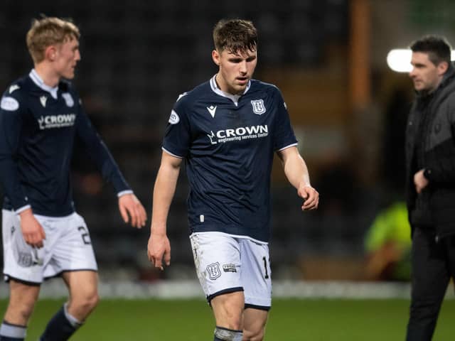 A disappointed Josh Mulligan leaves the field after Dundee's 3-1 loss to Partick Thistle at Dens Park. (Photo by Mark Scates / SNS Group)
