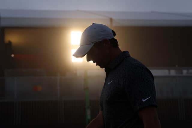 Rory McIlroy walks across a floodlit driving range in the fog before the pro-am prior to the Arnold Palmer Invitational presented by Mastercard at Arnold Palmer Bay Hill Golf Course in Orlando, Florida.