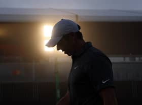 Rory McIlroy walks across a floodlit driving range in the fog before the pro-am prior to the Arnold Palmer Invitational presented by Mastercard at Arnold Palmer Bay Hill Golf Course in Orlando, Florida.