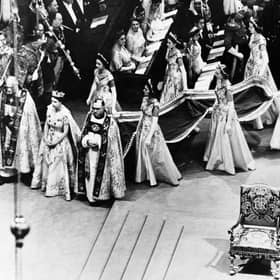 Queen Elizabeth II walks to the altar during her coronation ceremony on 2 June, 1953 in Westminster Abbey. PIC: AFP via Getty Images