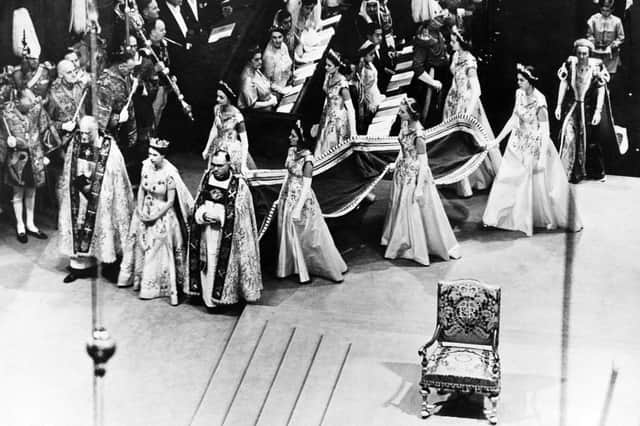 Queen Elizabeth II walks to the altar during her coronation ceremony on 2 June, 1953 in Westminster Abbey. PIC: AFP via Getty Images