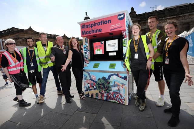 Fhona McCarthy shief executive joined forces with festival staff and then Lord Provost Frank Ross to launch an 'Inspiration Machine' next to the Half Price Hut on The Mound in 2019. Picture: Stewart Attwood
All images © Stewart Attwood Photography 2019. All other rights are reserved. Use in any other context is expressly prohibited without prior permission. No Syndication Permitted.