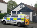 A police vehicle sits outside of A. Milne funeral directors in Balornock, Glasgow. Picture: Andrew Milligan/PA Wire