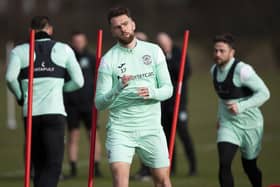 Former Aberdeen defender Mikey Devlin trains with Hibs following his release from Fleetwood Town. (Photo by Paul Devlin / SNS Group)