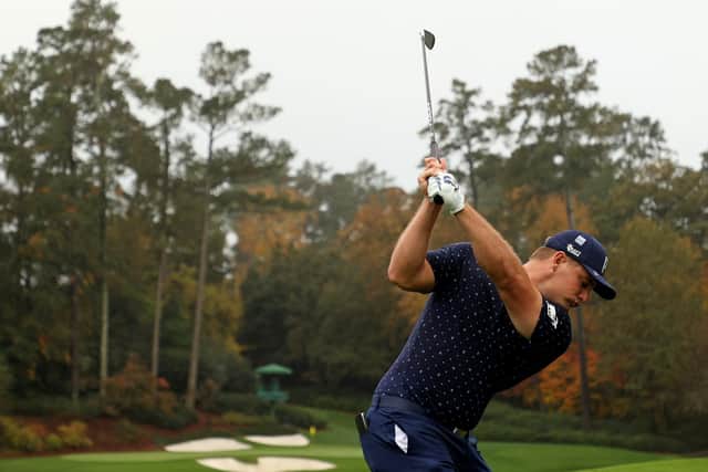 Bryson DeChambeau plays his shot from the 12th tee during a practice round prior to the Masters at Augusta National Golf Club. Picture: Patrick Smith/Getty Images