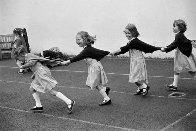 Girls running in the playground, Francis Holland Lower School, London (1988) by Markéta Luskačová