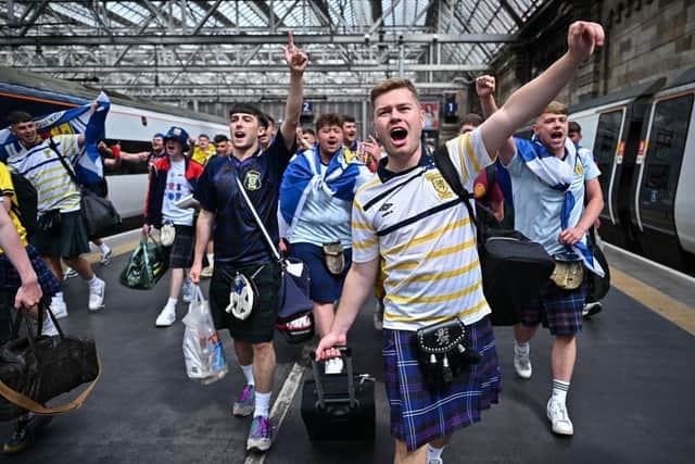Scotland fans make themselves heard on their way to London. (Photo by Jeff J Mitchell/Getty Images)