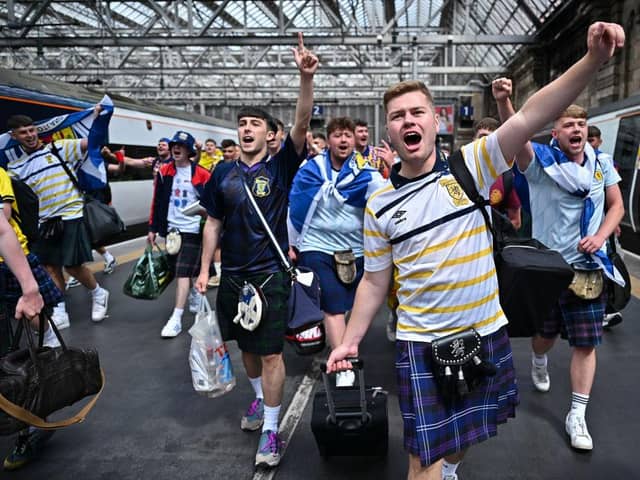 Scotland fans make themselves heard on their way to London. (Photo by Jeff J Mitchell/Getty Images)