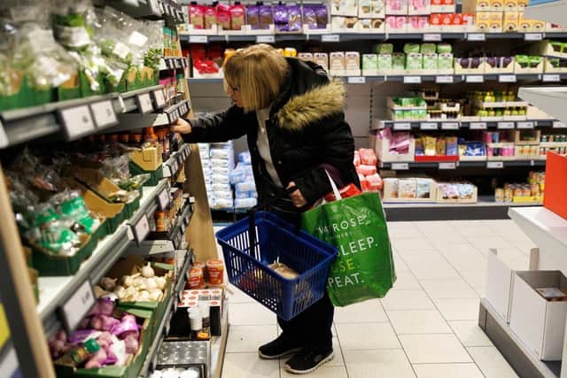 A customer looks at goods on a shelf in a supermarket. Picture: Dan Kitwood/Getty Images