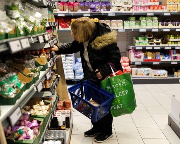 A customer looks at goods on a shelf in a supermarket. Picture: Dan Kitwood/Getty Images