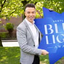 Host Des Clarke