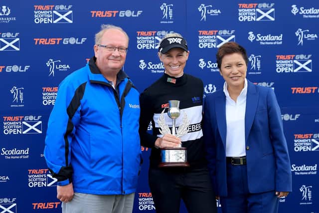 2021 Trust Golf Women's Scottish Open winner Ryann O'Toole is flanked by Paul Bush of of VisitScotland and Dr Prin Singhanart, founder and CEO of Trust Golf. Picture: David Cannon/Getty Images.