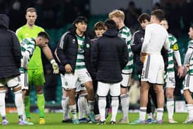 Celtic's Joe Hart (L) and Yang Hyun-Jun (C) look dejected at full-time after the 1-1 draw against Motherwell.