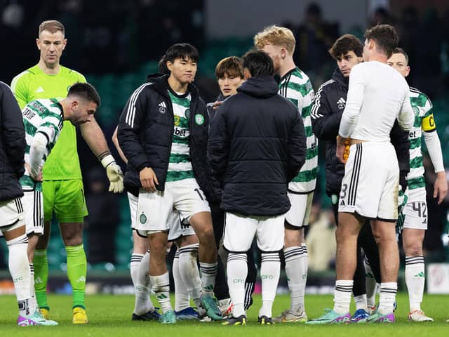Celtic's Joe Hart (L) and Yang Hyun-Jun (C) look dejected at full-time after the 1-1 draw against Motherwell.