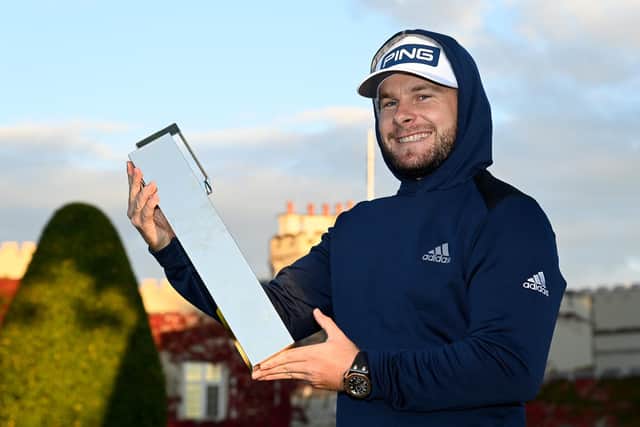 Tyrrell Hatton wearing his hoodie and holding the winners trophy at the BMW PGA Championship at Wentworth at the weekend. Picture: Ross Kinnaird/Getty Images