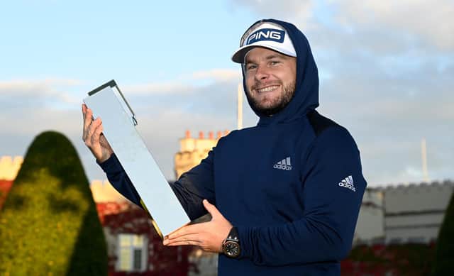 Tyrrell Hatton wearing his hoodie and holding the winners trophy at the BMW PGA Championship at Wentworth at the weekend. Picture: Ross Kinnaird/Getty Images