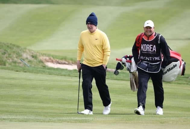 Bob MacIntyre and caddie Mike Thomson pictured during a practice round for the Korea Championship Presented by Genesis at Jack Nicklaus Golf Club Korea. Picture: Chung Sung-Jun/Getty Images.