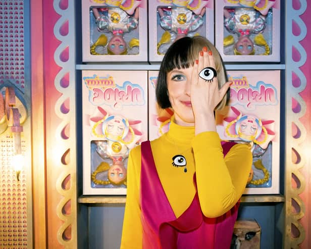 Rachael Maclean wearing ring and brooch from Tatty Devine collection