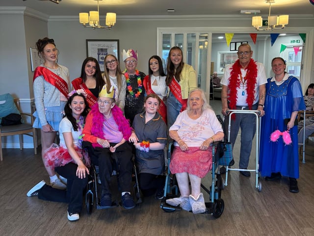 Group photo of residents, relatives and colleagues at HC-One Scotland’s Fullarton Care Home celebrating Marymass festival