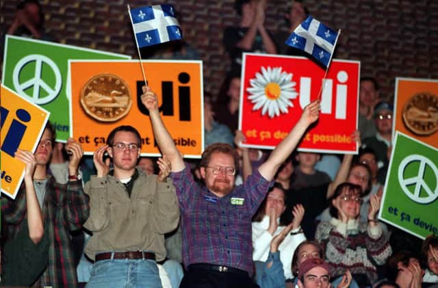 Yes supporters cheer during a speech by Bloc Quebecois leader Lucien Bouchard in Montreal in 1995 (Picture: Andre Pichette/AFP via Getty Images)