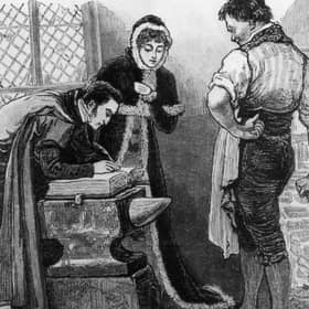 A couple from England get married in the famous blacksmith's shop at Gretna Green, taking advantage of Scotland's more relaxed marriage laws (Picture: Hulton Archive/Getty Images)