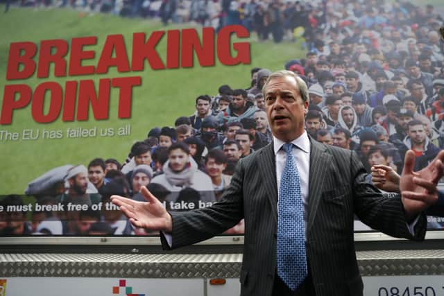 Nigel Farage stands in front of a poster that was compared to Nazi propaganda during the run-up to the Brexit referendum (Picture: Daniel Leal/AFP via Getty Images)