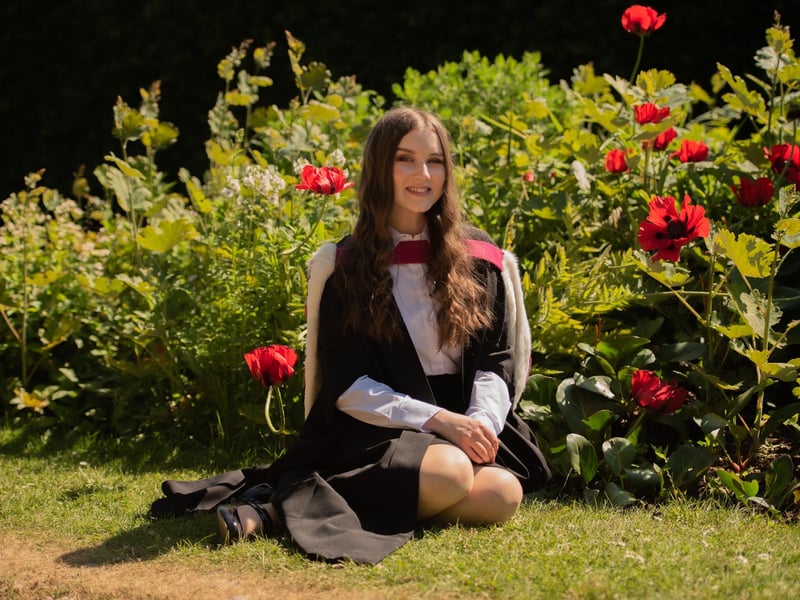 Kirsty MacDonald, who has attended five universities during a "12-year rollercoaster" of health issues celebrated her graduation with First-Class Honours in Neuroscience in the St Andrews Botanic Gardens