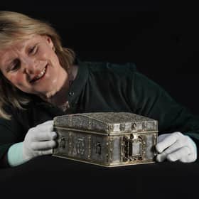 Dr Anna Groundwater, principal Curator at the the National Museum Scotland, with a rare French silver casket believed to have belonged to Mary Queen of Scots. Picture: Stewart Attwood