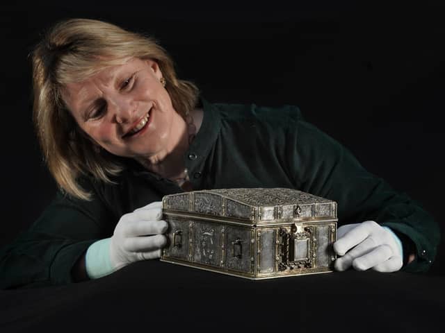Dr Anna Groundwater, principal Curator at the the National Museum Scotland, with a rare French silver casket believed to have belonged to Mary Queen of Scots. Picture: Stewart Attwood