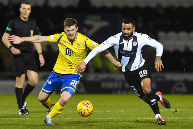 St Johnstone’s Anthony Ralston competes with Alex Jakubiak during the Ladbrokes Premiership match at The Simple Digital Arena. Picture: SNS