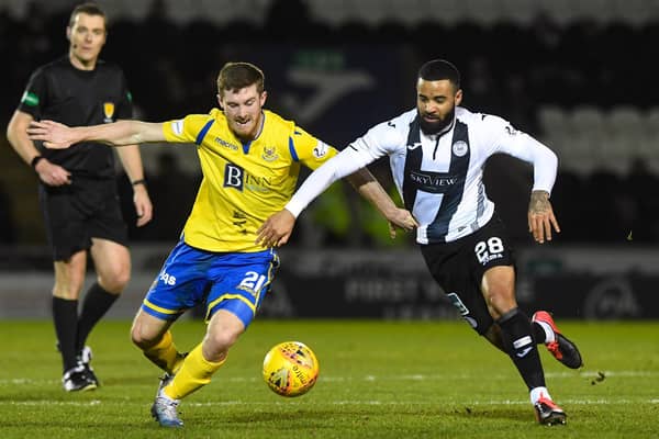 St Johnstone’s Anthony Ralston competes with Alex Jakubiak during the Ladbrokes Premiership match at The Simple Digital Arena. Picture: SNS