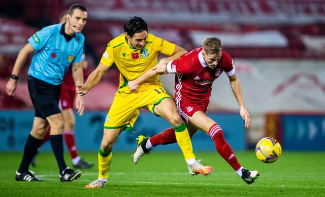 Hibs' Joe Newell and Ross McCrorie in action during the Easter Road side's trip to Aberdeen last November. Picture: SNS