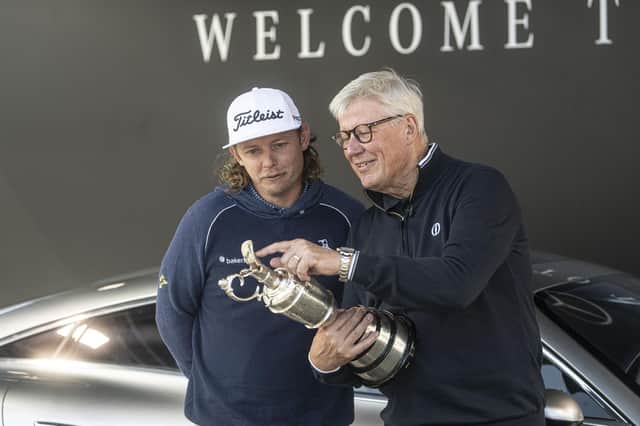 2022 Open champion Cameron Smith and R&A CEO Martin Slumbers look at the Claret Jug after it was brought back by the Australian at the start of 151st Open week at Royal Liverpool. Picture: Tom Russo|Daily Reporter