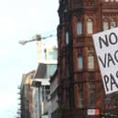 Demonstrators take part in a protest against Covid certification in Belfast city centre at the weekend. First Minister Nicola Sturgeon is expected to announce an extension of the scheme in Scotland on Tuesday. Photo: Dominic McGrath/PA Wire
