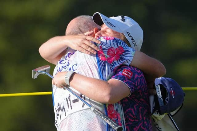 Gemma Dryburgh celebrates landing a maiden LPGA Tour triumph with caddie Paul Heselden. Picture: Yoshimasa Nakano/Getty Images.