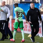 Neil Lennon shakes hands with Boli Bolingoli prior to the full-back's appearance against Kilmarnock. Picture: SNS