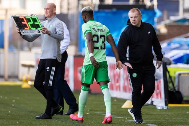 Neil Lennon shakes hands with Boli Bolingoli prior to the full-back's appearance against Kilmarnock. Picture: SNS