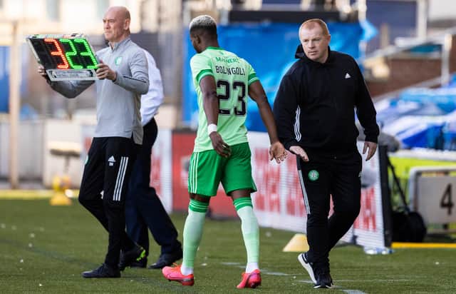 Neil Lennon shakes hands with Boli Bolingoli prior to the full-back's appearance against Kilmarnock. Picture: SNS