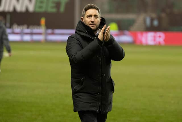 Hibs manager Lee Johnson applauds the fans after his team's 6-0 win over Aberdeen on Saturday. (Photo by Paul Devlin / SNS Group)