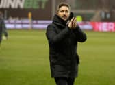Hibs manager Lee Johnson applauds the fans after his team's 6-0 win over Aberdeen on Saturday. (Photo by Paul Devlin / SNS Group)